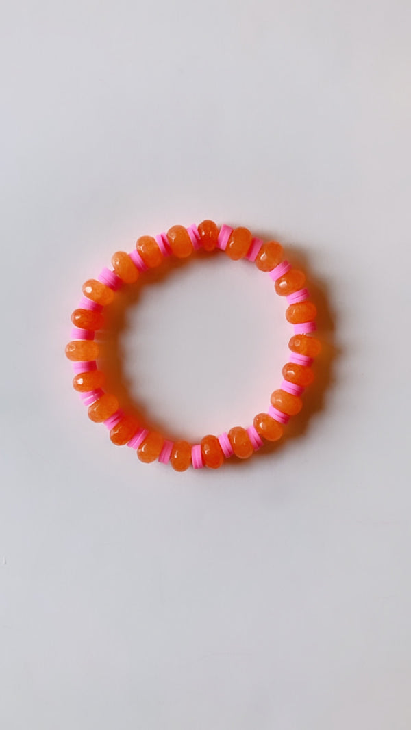 Orange rondelle and pink bracelet