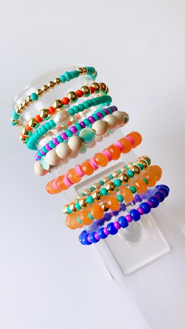 Orange rondelle and pink bracelet
